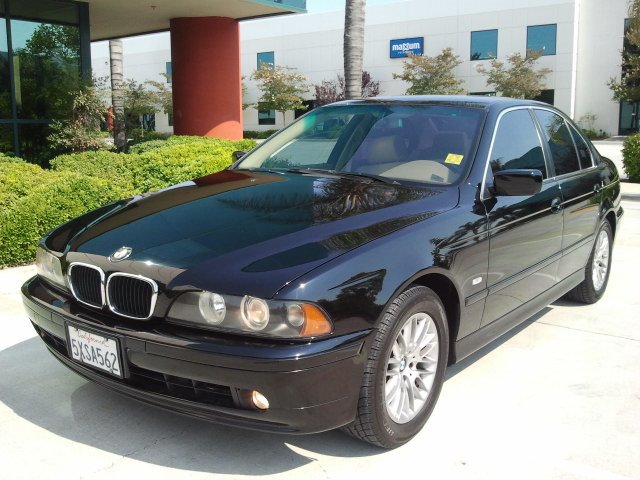 BMW 5 series 4-passenger Open Top Alpha AWD Truck Sedan