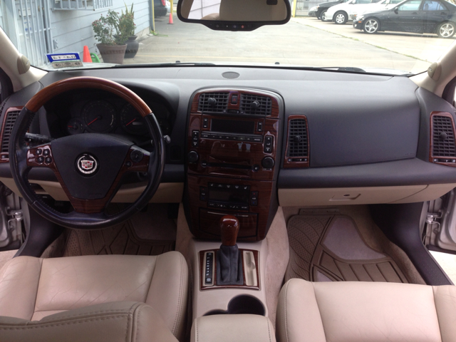 Cadillac CTS Ram 1500 Quad Cab SLT Pickup 4D 6 1/4 Ft Sedan