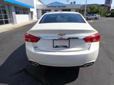 Chevrolet Impala 2010 Kia SX Sedan
