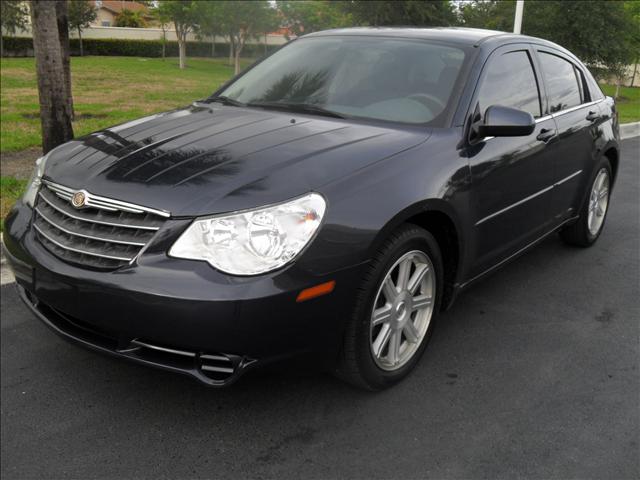 Chrysler Sebring 2011 Toyota LE Sedan
