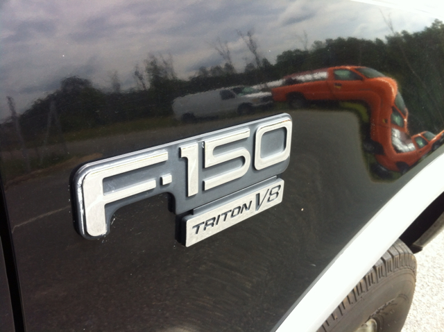 Ford F150 Crew Cab 143.5 WB 4WD SLT Pickup Truck