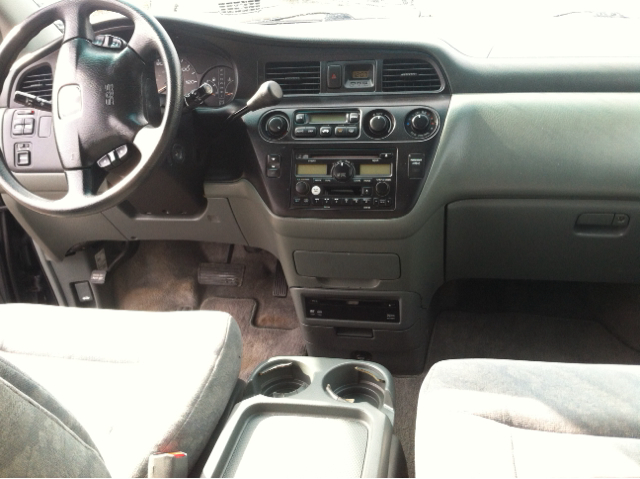 Honda Odyssey 4dr Quad Cab 160.5 DRW 4WD Laramie MiniVan