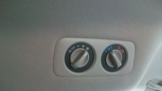 Honda Odyssey 4dr Quad Cab 160.5 DRW 4WD Laramie MiniVan