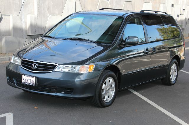 Honda Odyssey 4dr Quad Cab 160.5 DRW 4WD Laramie MiniVan