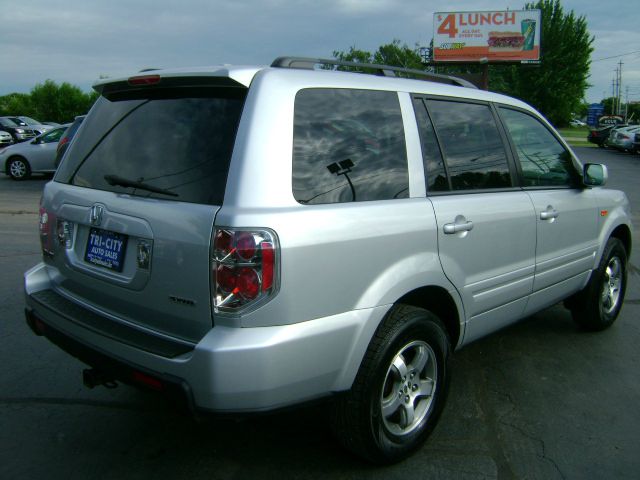 Honda Pilot 2010 Cadillac CTS SUV