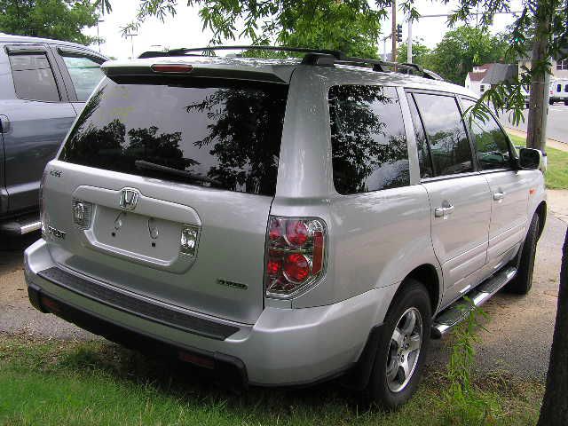 Honda Pilot 2010 Cadillac CTS SUV