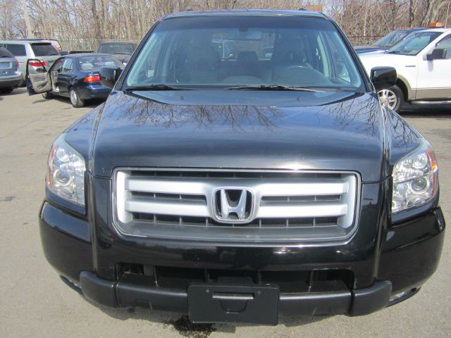 Honda Pilot 2010 Cadillac CTS SUV