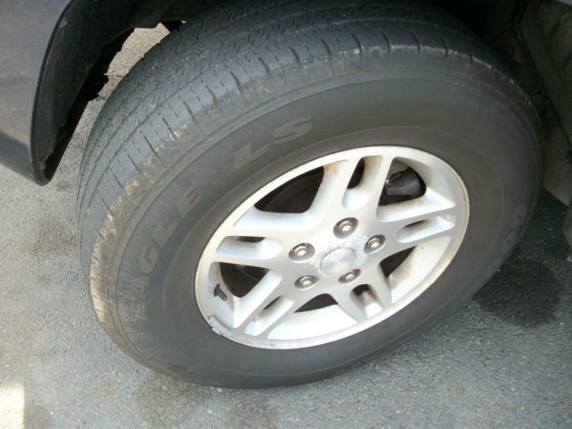 Jeep Grand Cherokee 4dr 114 WB W/4.6l AWD SUV