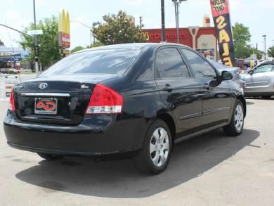 Kia Spectra Open-top Sedan