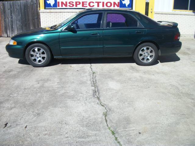 Mazda 626 Elk Conversion Van Sedan