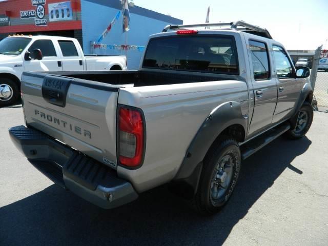Nissan Frontier 2WD Access I4 AT (natl) Pickup Truck