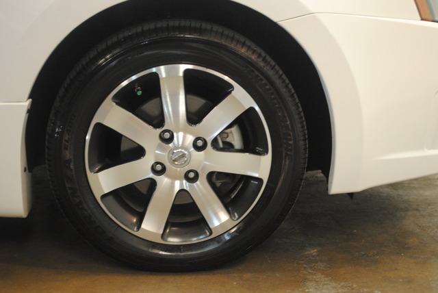 Nissan Sentra 4dr Sdn Touring Signature RWD Sedan