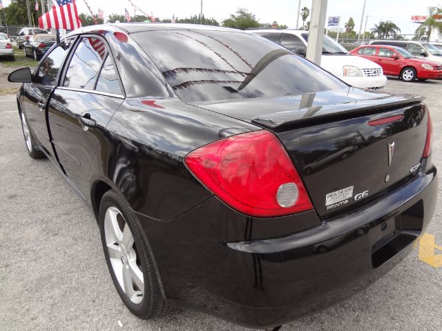 Pontiac G6 4dr Quad Cab WB 4WD SLT Sedan