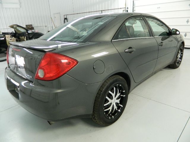 Pontiac G6 4dr Quad Cab WB 4WD SLT Sedan