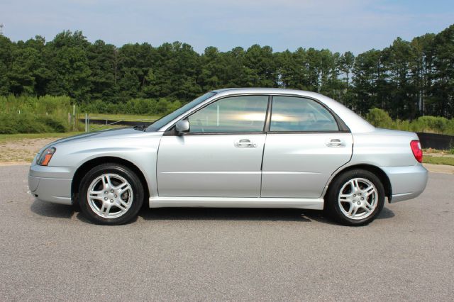 Subaru Impreza 4dr Sdn LS Auto Sedan