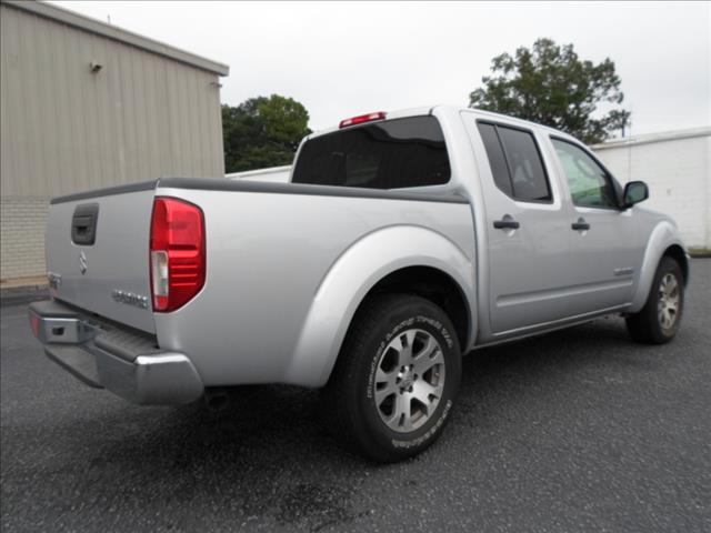 Suzuki Equator 2011 photo 3