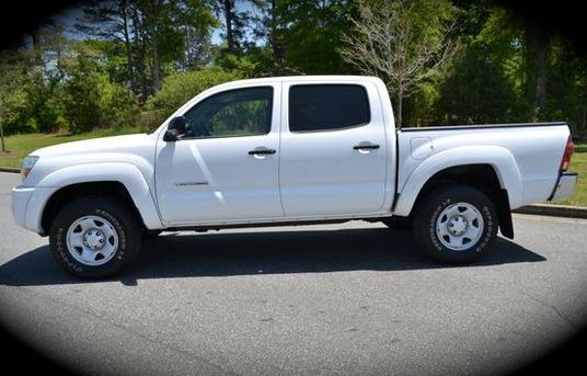 Toyota Tacoma 2011 Kia SX Pickup Truck